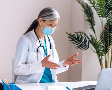 woman-mediacal-nurse-doctor-uniform-sick-online-video-call-webcam
